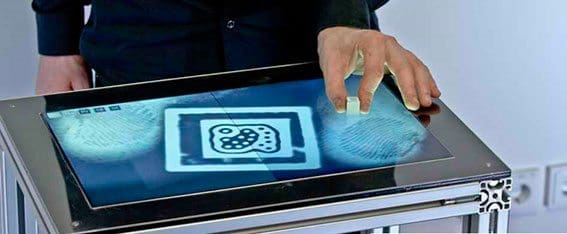 The system recognises as the access code fiducial markers attached to an object.