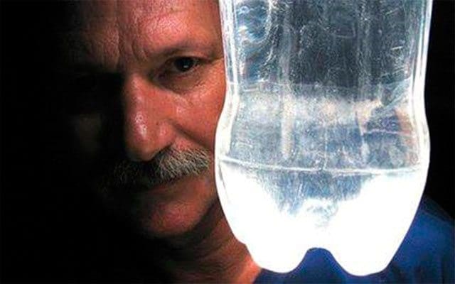 The Lamp Without Electricity for the Poor 1 Alfredo Moser with one of his lamps.